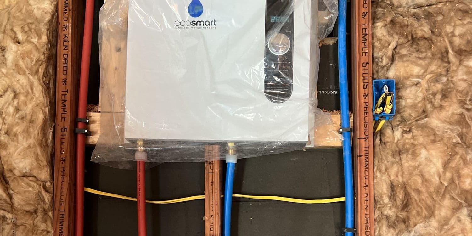 Electric tankless water heater going in with new red and blue PEX lines